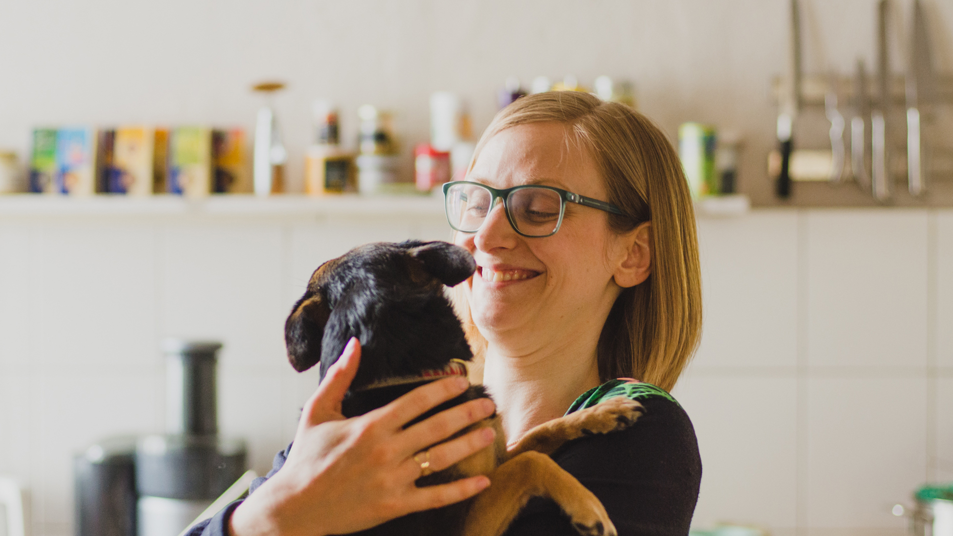 Yoga Teacher, Isabella Paulsen with her dog.