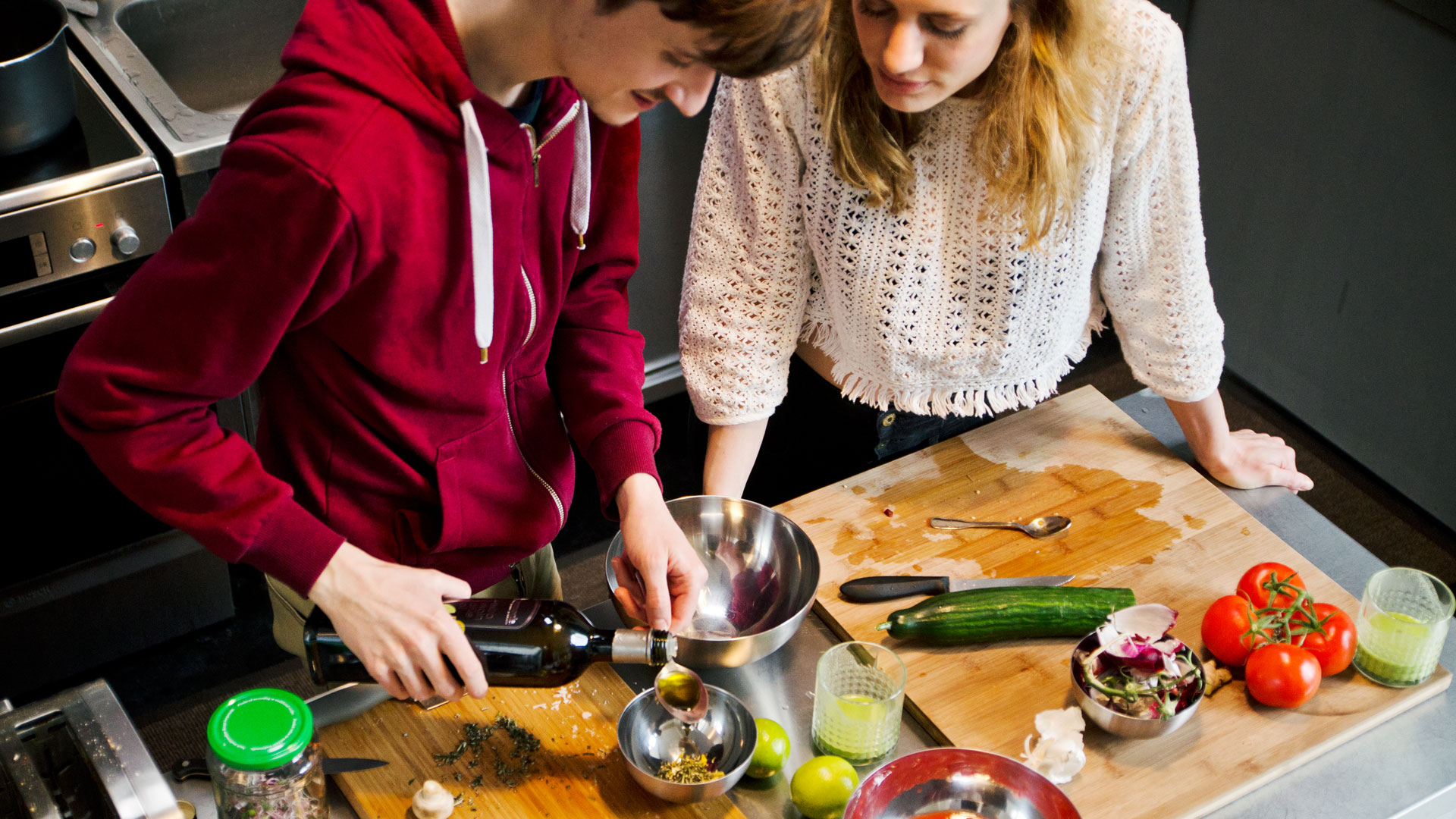 Alastair Coates and Nina Wagner prepare ingredients for their recipes