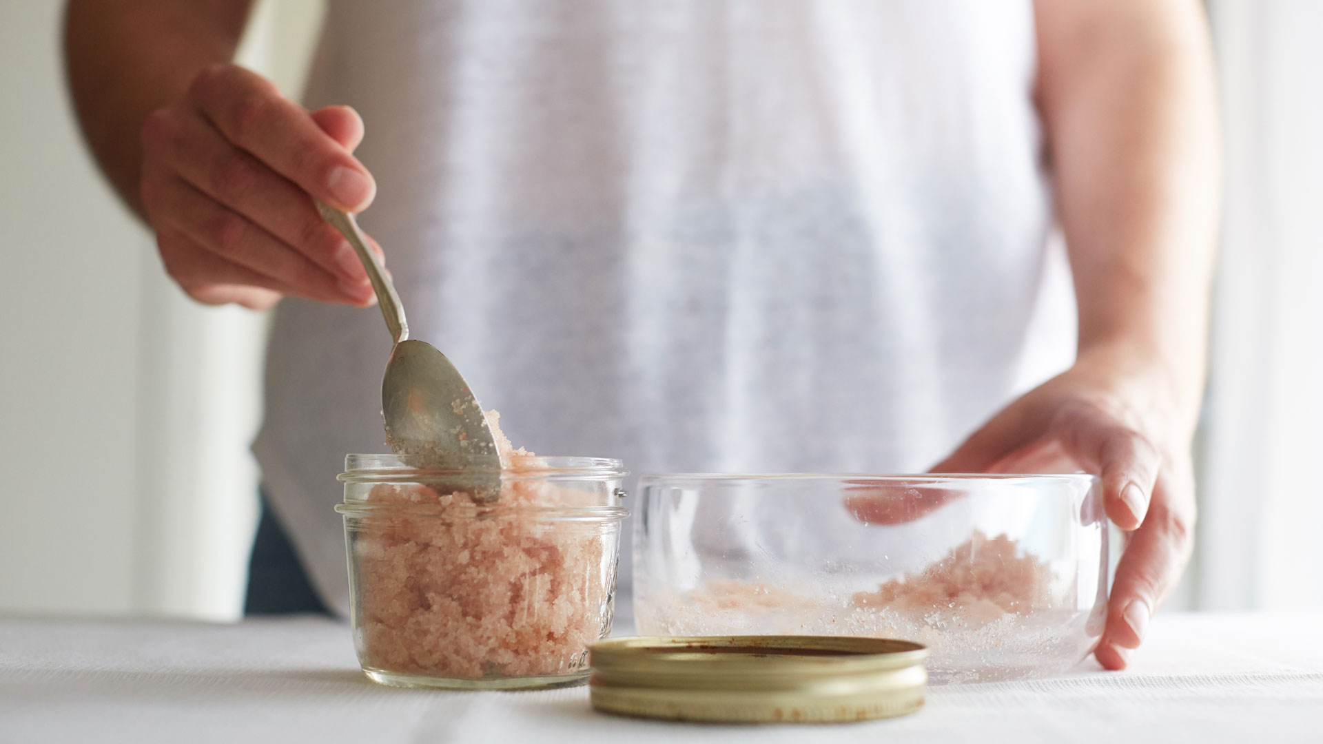 Mixing-ingredients-for-Caroline-Wachsmuth's-natural-Pink-Salt-Body-Scrub-recipe-Foodadit