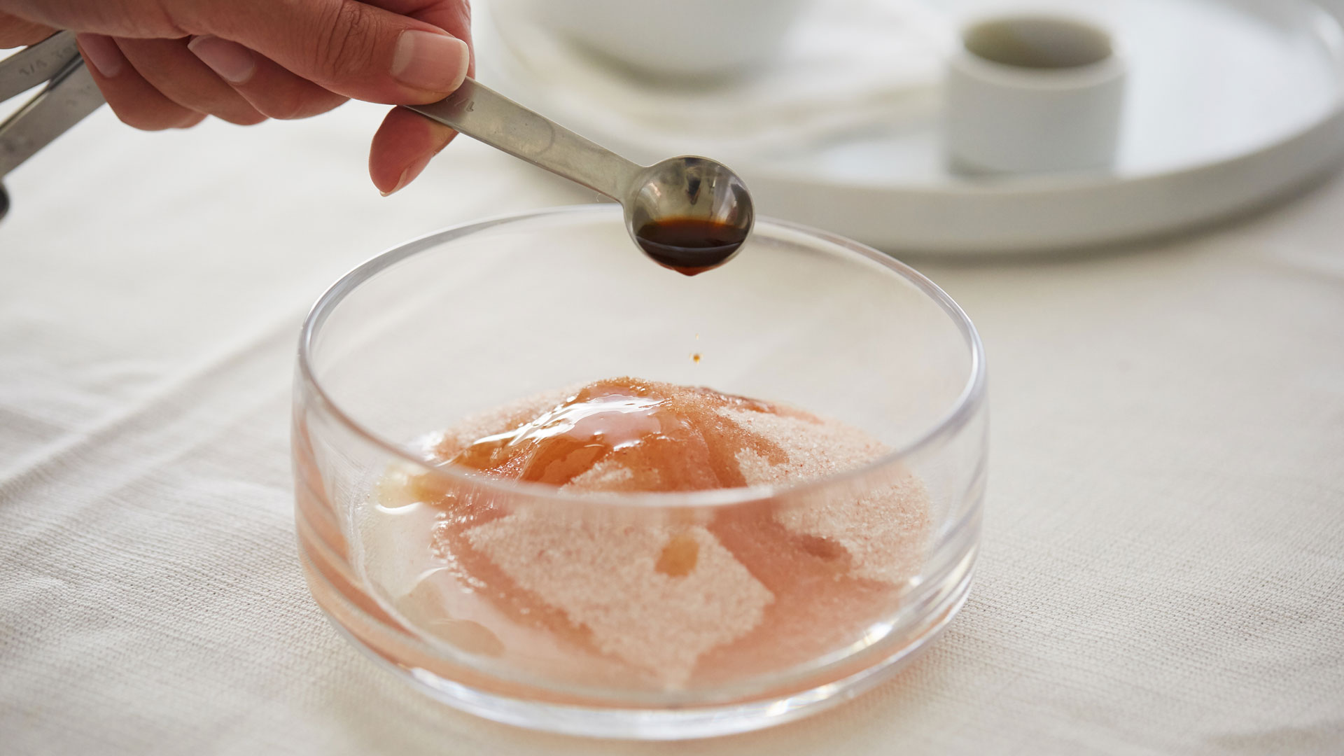 Preparing-ingredients-for-Caroline-Wachsmuth's-natural-Pink-Salt-Body-Scrub-recipe-Foodadit