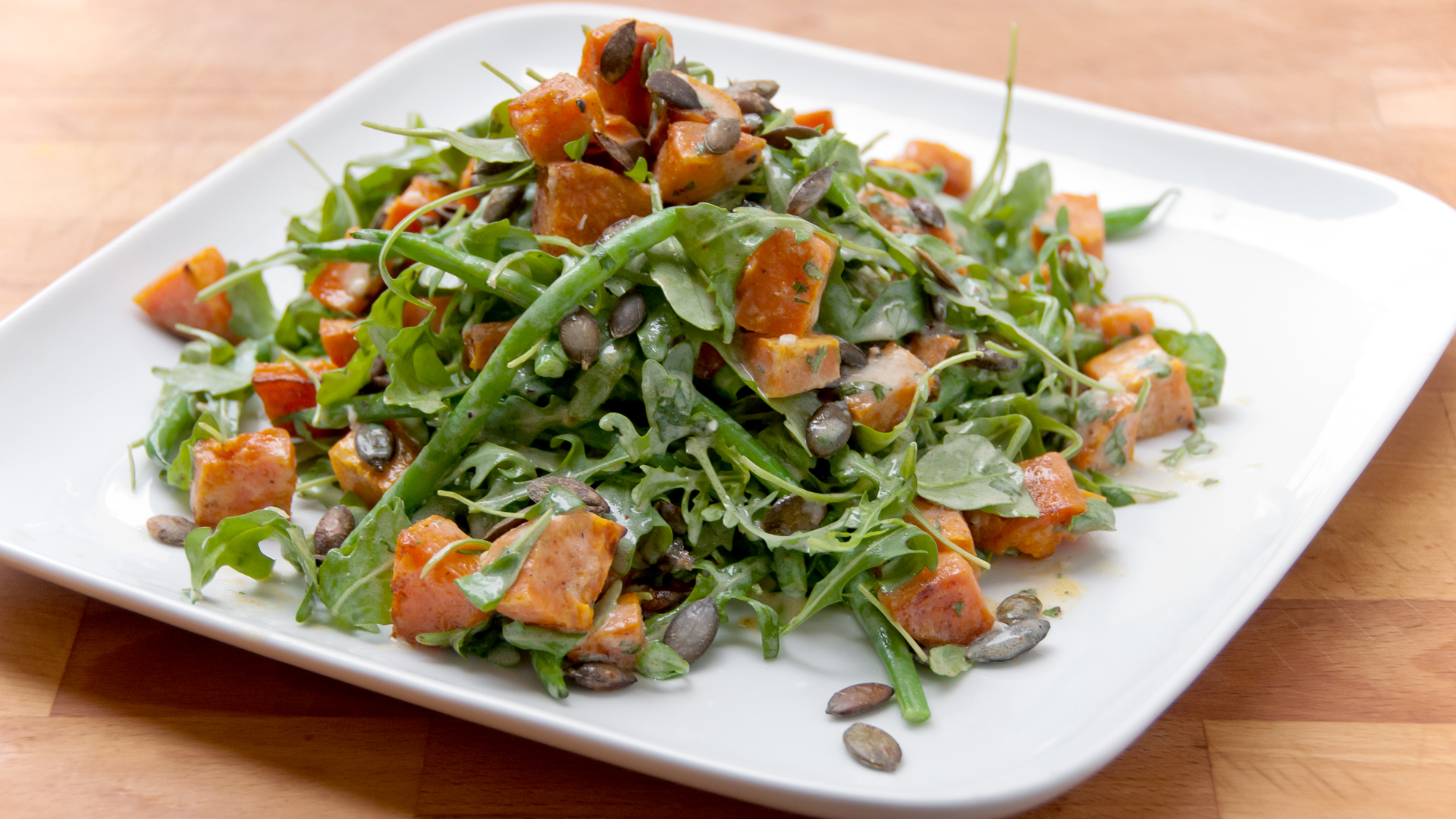 Carlin Greenstein's recipe for her arugula salad of sweet potatoes and haricot verts